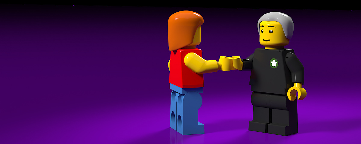 Working Together - Two Lego characters shaking hands. Image rendered using 3DS Max and Vray