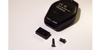 Datatool Remote Key Fob Repair - Step One - Remove the case screw and plastic insert